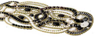 This black and white high-fashion Ziio bracelet is handmade in Italy with pearls, black tourmaline and sterling silver.