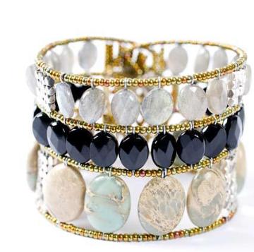 Italian designer Ziio makes this masterful bracelet of semi-precious stones like black tourmaline, labradorite and agate.