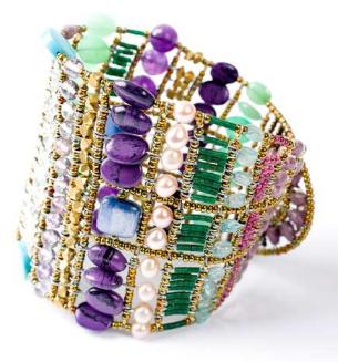 This bold Ziio bracelet is statement jewelry at its best. This artisan Italian bracelet is made with amethyst, susolite, chrysoprase, serpentine, kyanite and sterling silver.